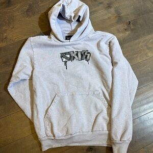 Stylish Gray Hoodie with Graphic Design